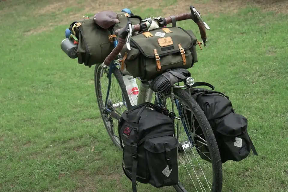 Cyclist Alessandro Gallo with Carradice bags crossing China