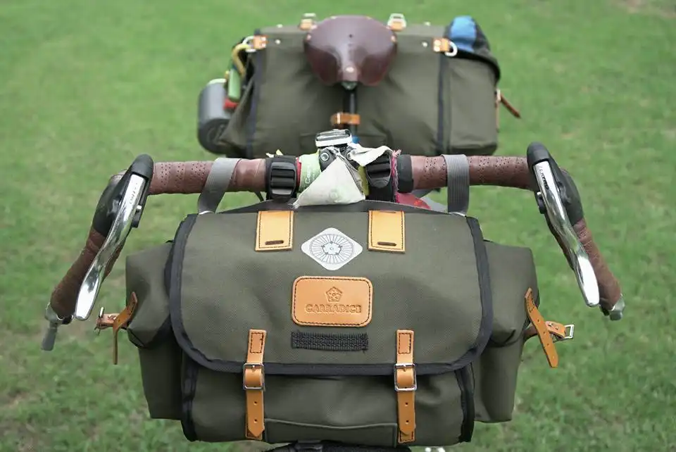 Cyclist Alessandro Gallo with Carradice bags crossing China