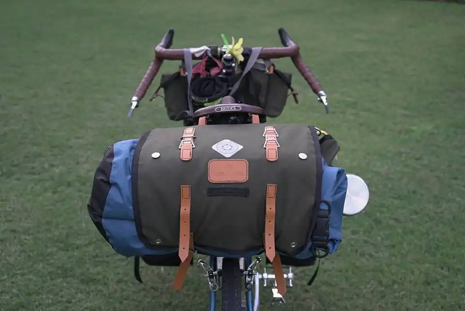 Cyclist Alessandro Gallo with Carradice bags crossing China